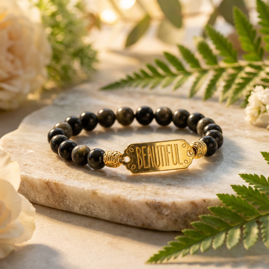 Elastische edelsteen armband met gouden obsidiaan en gouden tussenzetsel beautiful
