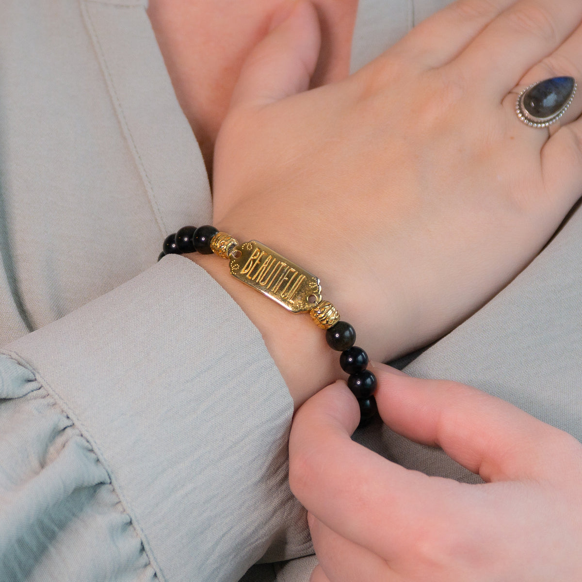 Elastische edelsteen armband met gouden obsidiaan en gouden tussenzetsel beautiful